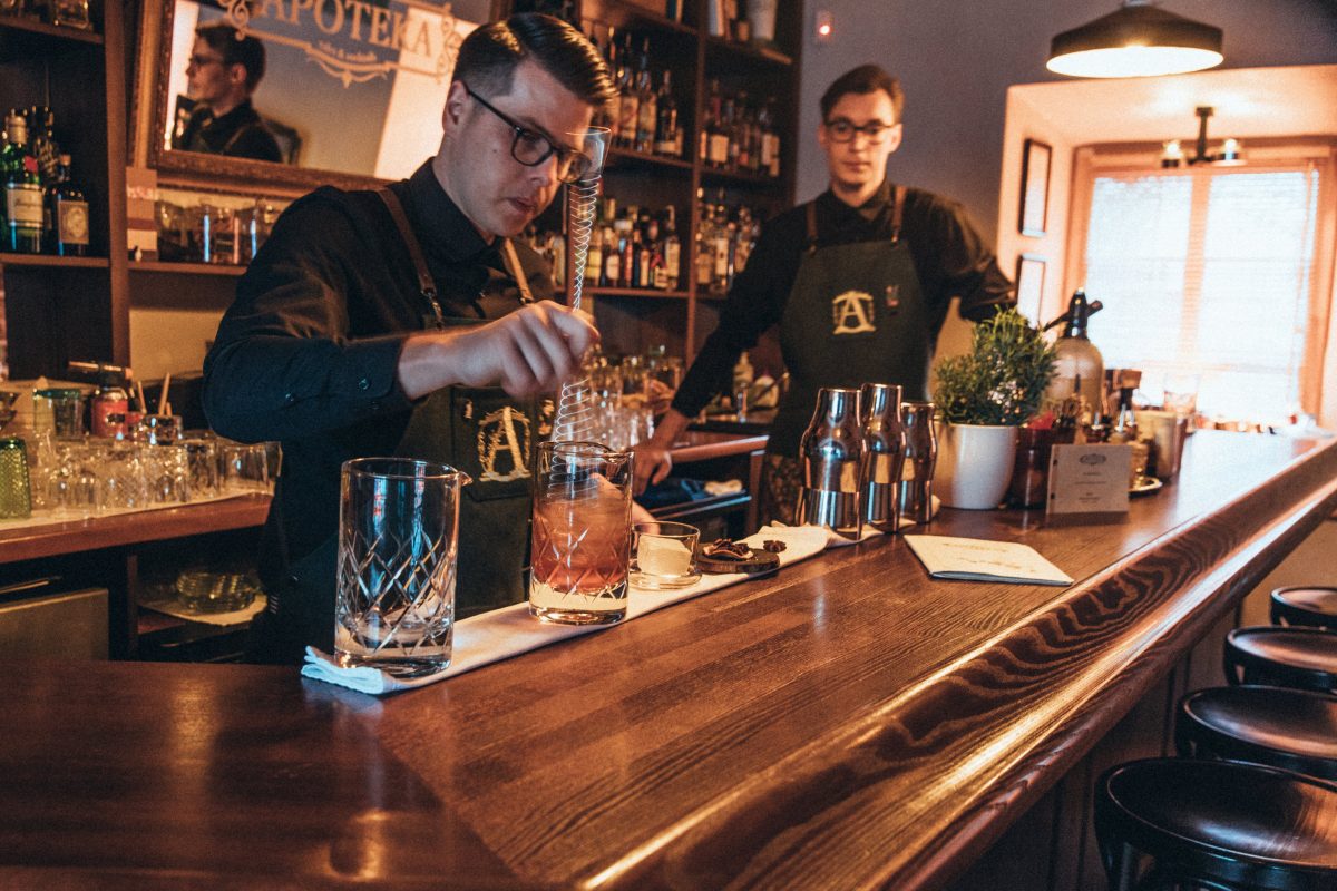 Bartenders working at Apoteka bar in Vilnius